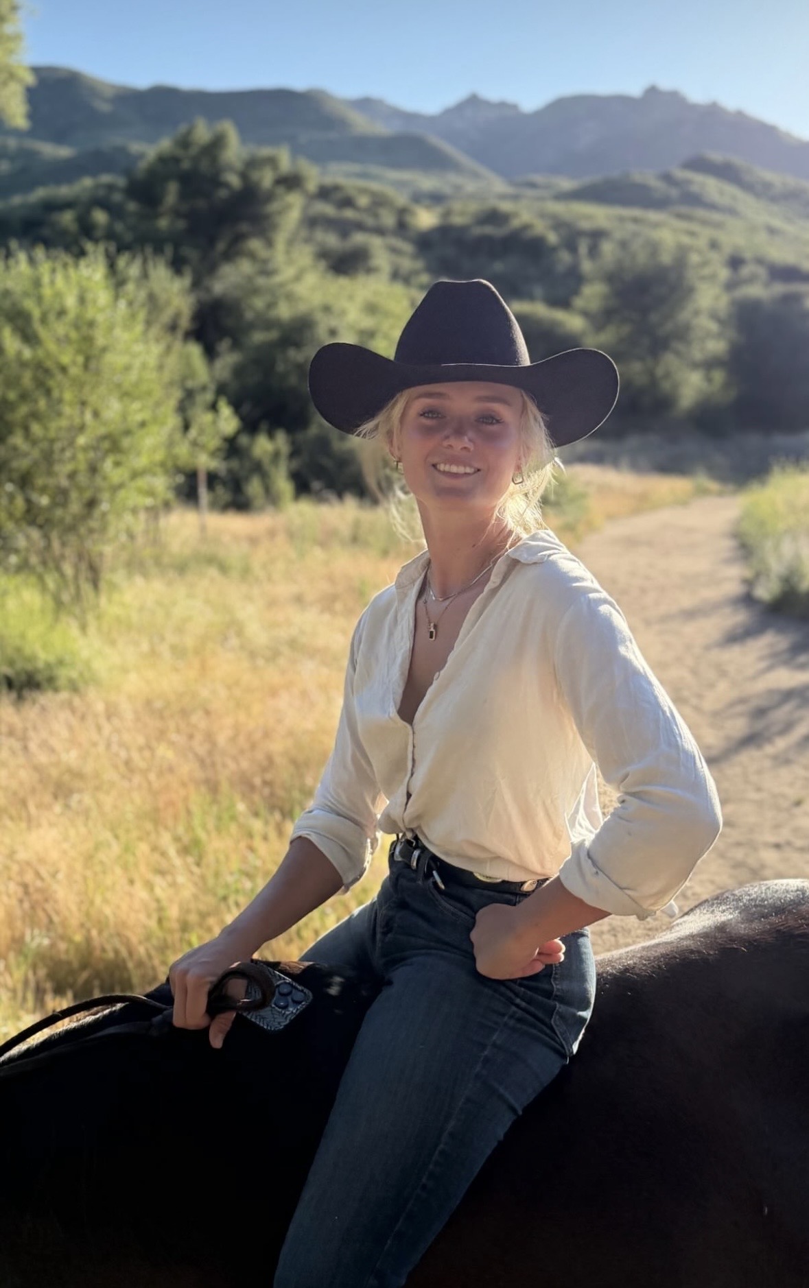 Alexia Shea standing with her horse